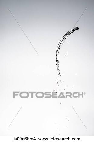 Picture - Water splashing in air. Fotosearch