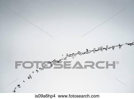 Picture - Water splashing in air. Fotosearch