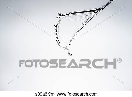 Picture - Water splashing in air. Fotosearch