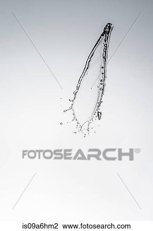 Stock Image - Water splashing in air. Fotosearch