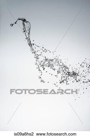 Stock Image - Water splashing in air. Fotosearch
