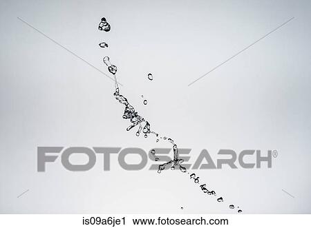 Stock Image - Water splashing in air. Fotosearch