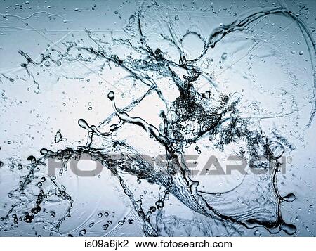 Stock Image - Water splashing in air. Fotosearch