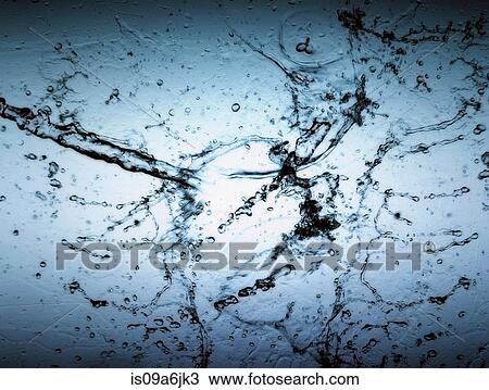 Stock Image - Water splashing in air. Fotosearch