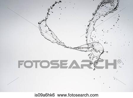 Stock Photograph - Water splashing in air. Fotosearch