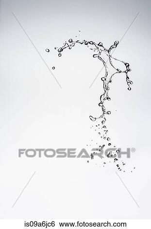 Water splashing in air View Large Photo Image Stock Photograph - Water splashing in air. Fotosearch