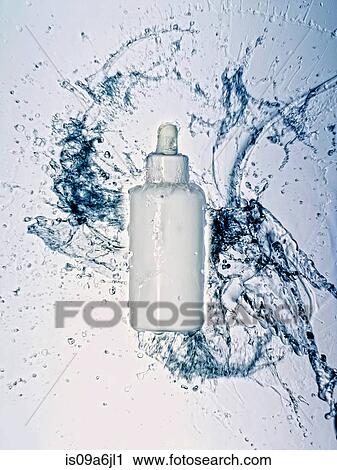 Water splashing on bottle View Large Photo Image Stock Image - Water splashing on bottle. Fotosearch