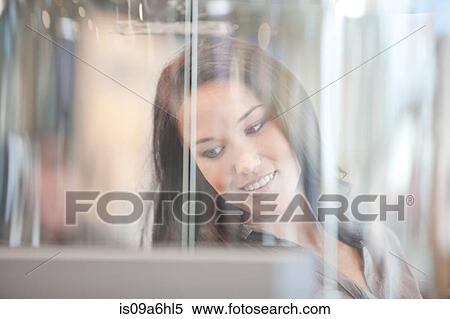 Woman standing in glass case View Large Photo Image Stock Photography - Woman standing in glass case. Fotosearch