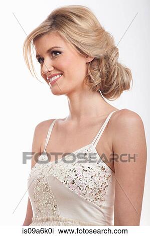 Stock Image - Woman wearing white top. Fotosearch