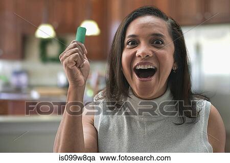 Woman with winning ticket View Large Photo Image Stock Image - Woman with winning ticket. Fotosearch