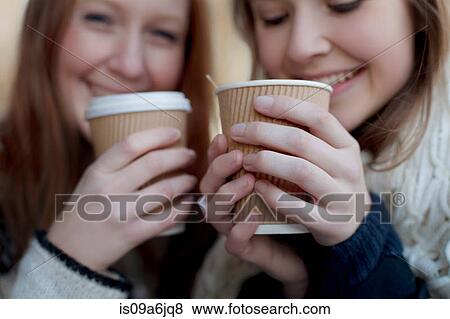 Women having coffee together View Large Photo Image Stock Photo - Women having coffee together. Fotosearch