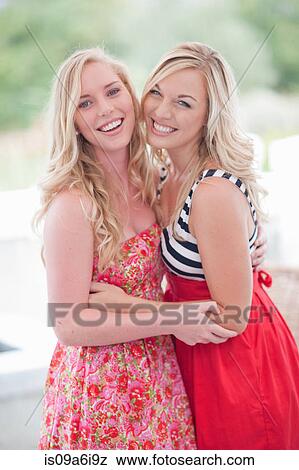 Women smiling together outdoors View Large Photo Image Stock Photo - Women smiling together outdoors. Fotosearch