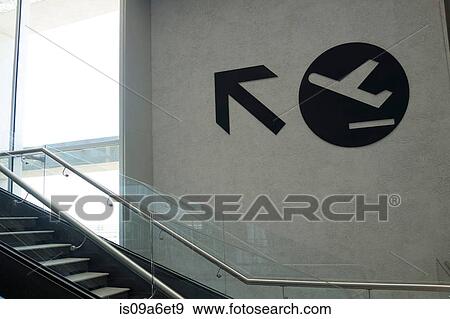 Arrow sign in airport View Large Photo Image Stock Photo - Arrow sign in airport. Fotosearch