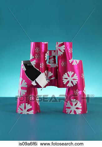 Binoculars wrapped in christmas paper View Large Photo Image Stock Image - Binoculars wrapped in christmas paper. Fotosearch