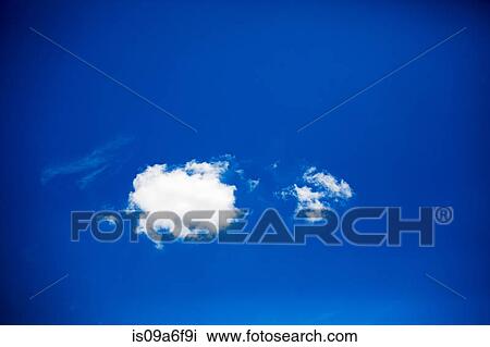 Stock Image - Blue sky with white cloud. Fotosearch