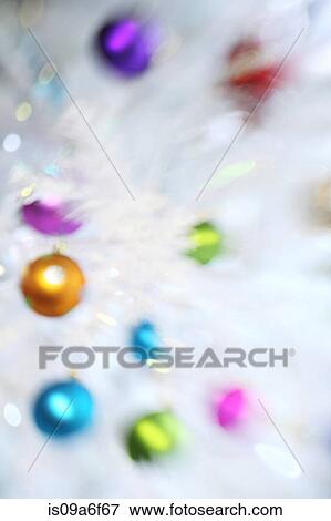 Stock Photo - Blurred christmas baubles. Fotosearch