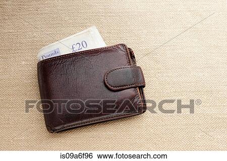 Brown leather wallet with twenty pound note View Large Photo Image Stock Photograph - Brown leather wallet with twenty pound note. Fotosearch