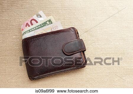 Brown leather wallet with various currencies View Large Photo Image Stock Photo - Brown leather wallet with various currencies. Fotosearch