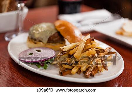 Burger and french fries View Large Photo Image Stock Image - Burger and french fries. Fotosearch