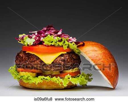 Stock Photo - Burger with slice of apple. Fotosearch