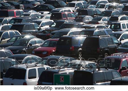 Cars in busy parking lot View Large Photo Image Stock Photography - Cars in busy parking lot. Fotosearch