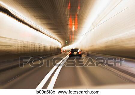 Stock Image - Cars in tunnel. Fotosearch