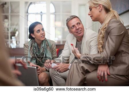 Casual business meeting View Large Photo Image Stock Image - Casual business meeting. Fotosearch