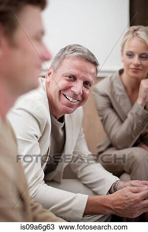 Casual business meeting View Large Photo Image Stock Image - Casual business meeting. Fotosearch