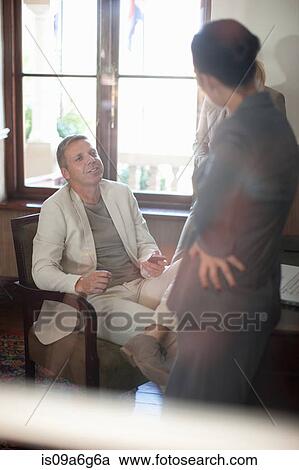 Stock Image - Casual business meeting. Fotosearch