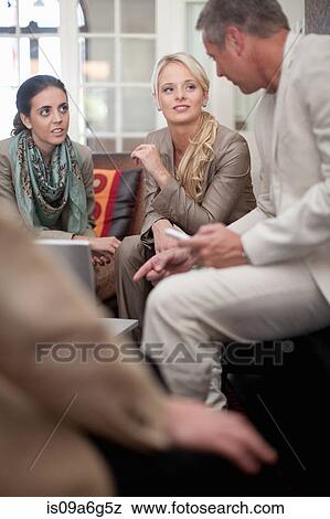 Stock Photo - Casual business meeting. Fotosearch