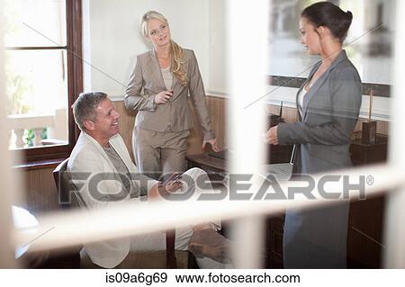 Stock Photo - Casual business meeting. Fotosearch