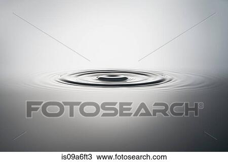 Circles rippling on water surface View Large Photo Image Stock Image - Circles rippling on water surface. Fotosearch