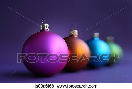 Stock Photo - Colorful row of christmas baubles. Fotosearch