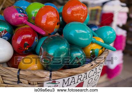 Stock Image - Colourful maracas for sale. Fotosearch