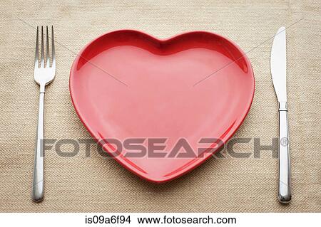 Picture - Empty heart shaped plate. Fotosearch