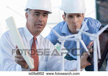 Engineers with model wind turbines View Large Photo Image Stock Image - Engineers with model wind turbines. Fotosearch
