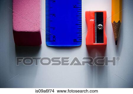 Picture - Eraser, ruler, pencil sharpener and pencil. Fotosearch