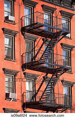 Picture - Fire escape red brick building. Fotosearch
