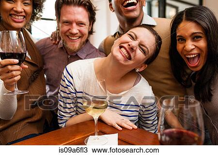 Stock Image - Group photo with huge smiles. Fotosearch