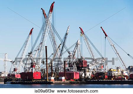 Stock Photo - Harbor loading cranes, New York City, USA. Fotosearch