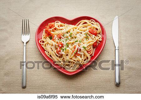 Heart shaped plate with pasta View Large Photo Image Stock Photography - Heart shaped plate with pasta. Fotosearch