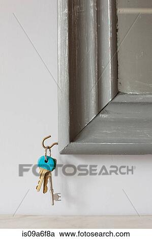 House keys on hook on mirror View Large Photo Image Stock Image - House keys on hook on mirror. Fotosearch