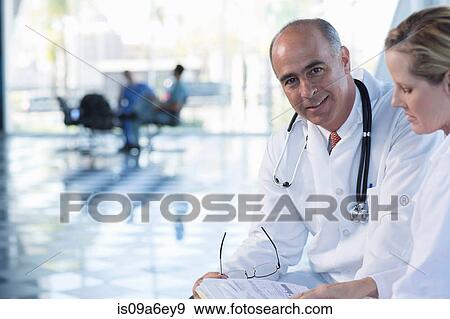 Male and female doctors View Large Photo Image Stock Photo - Male and female doctors. Fotosearch