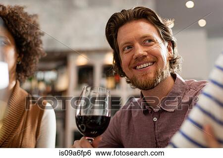 Stock Photograph - Man with wine glass. Fotosearch