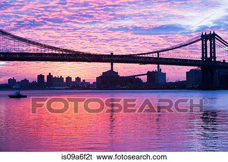 Stock Photograph - Manhattan bridge at dusk, New York City, USA. Fotosearch