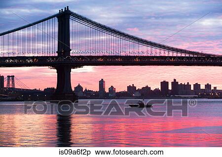 Stock Photography - Manhattan bridge at sunset, New York City, USA. Fotosearch
