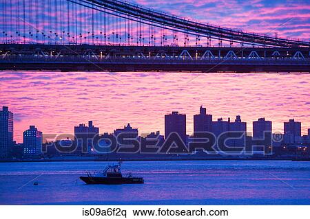 Stock Photography - Manhattan bridge at sunset, New York City, USA. Fotosearch