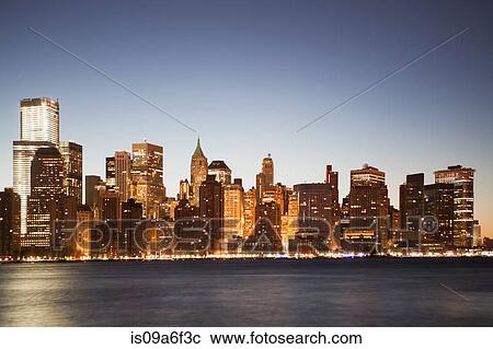 Stock Image - Manhattan skyline at dusk, New York City, USA. Fotosearch