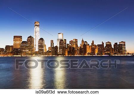 Stock Image - Manhattan skyline at dusk, New York City, USA. Fotosearch