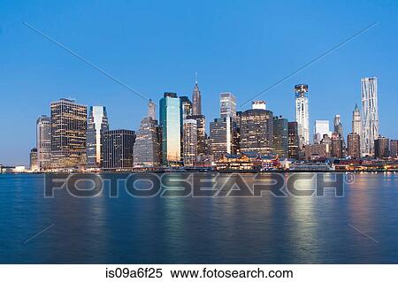 Stock Photography - Manhattan skyline at sunset, New York City, USA. Fotosearch